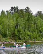 Another canoe party passing our campsite while watching a passing eagle