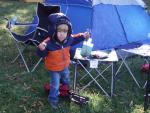 hes playing with the marshmellow sticks I left on that little table... sorry to all the people he may have poked!