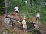 We were wind-bound so we found downed trees and made a shelter to pass the time.