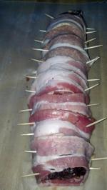 Deer backstrap wrapped in bacon
