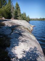 Rock ledge at portage landing on the Gull Lake side of portage to Home Lake.