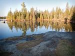Sun rises on crisp morning at campsite on Quadga Lake.