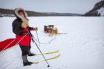 Dan and Brian pause before continuing down Clearwater Lake with their dogs.