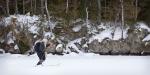 Dan skis back toward camp on Clearwater Lake.
