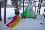 Dan closes up his sleeping bag for the day.