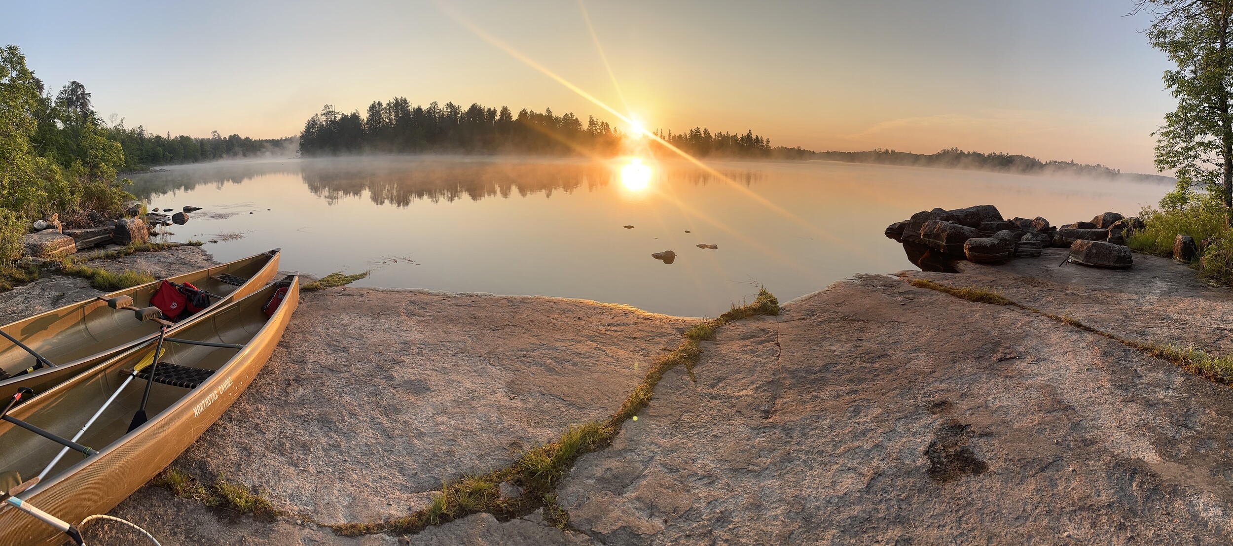 Flaming sun and foggy morning