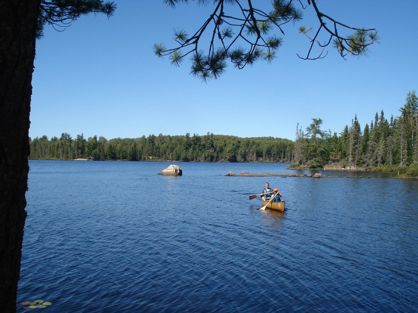 Paddling into camp.