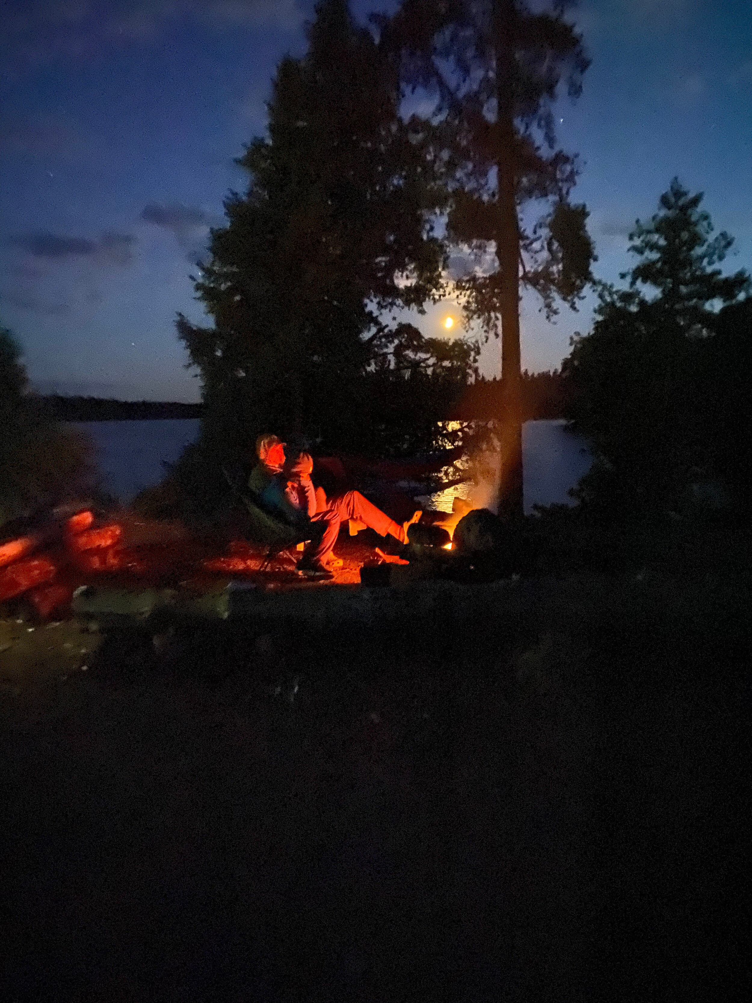 Moon over campfire