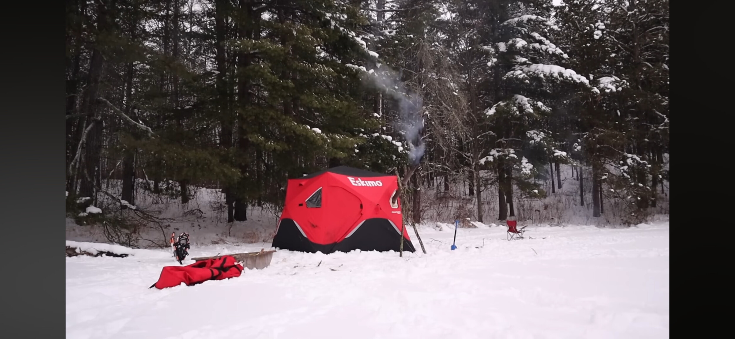 Eskimo hub shelter with wood stove